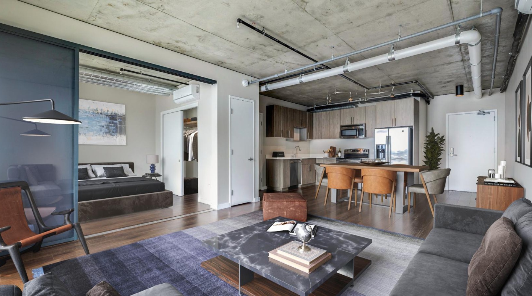 a living room with a couch and a table